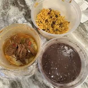 Ropa vieja with yellow rice and black beans