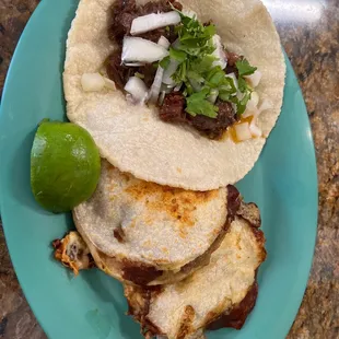 Taco de barbacoa and 2 ground beef chile verde Gorditas