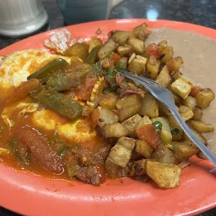 Huevos Rancheros con Papa $8.99