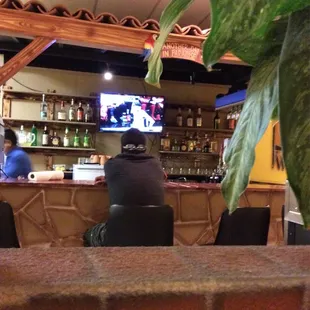 a man sitting at the bar