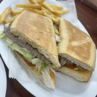 Side view of  Steak Sandwich/Sandwich de Bistec
