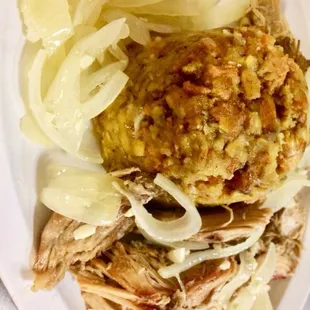 Savory and delicious mofongo with lechon asado!