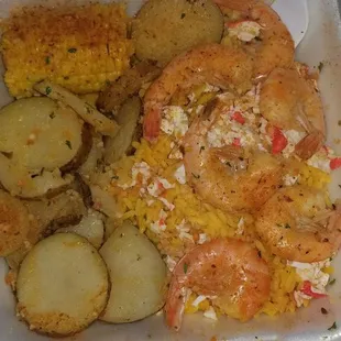 Shrimp and rice place, with added potatoes