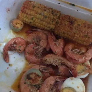 Shrimp platter 8 shrimp, 1ear corn cut in half, 2 boiled eggs cut in half, great seasoning but not enough bang for $15