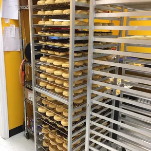 a rack of doughnuts in a bakery