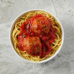 a bowl of spaghetti and meatballs