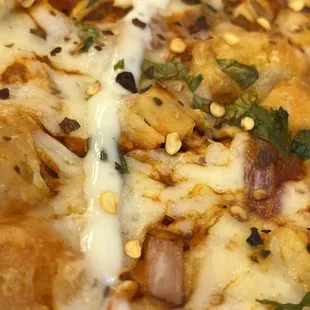 Slice of Buffalo chicken pizza.