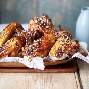 a plate of chicken wings