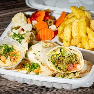 a chicken burrito and french fries