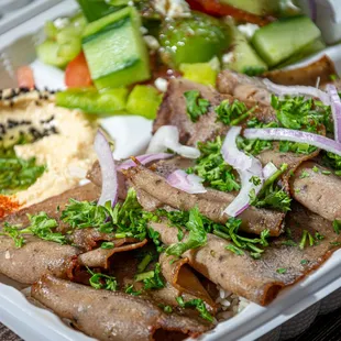 a meal in a styrofoam container