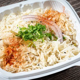 a bowl of rice and vegetables