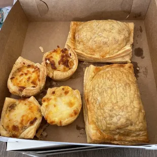 a variety of pastries in a box
