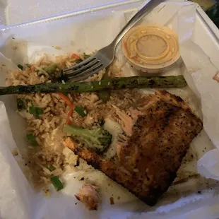 Blackened salmon with Fried rice and asparagus wish I would have takin the picture at the began, it&apos;s a little late just so good.