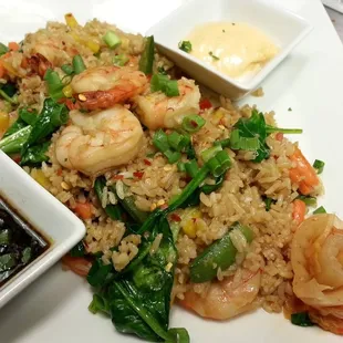 a plate of food with shrimp and rice
