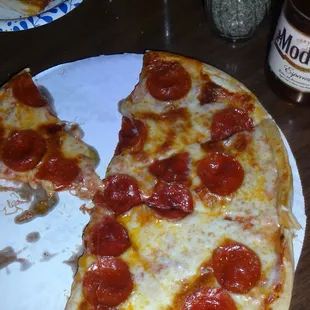 Pizza and Modelo Beer