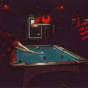 a man playing pool