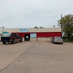 Main entrance is on side of gas station past the fuel pumps.
