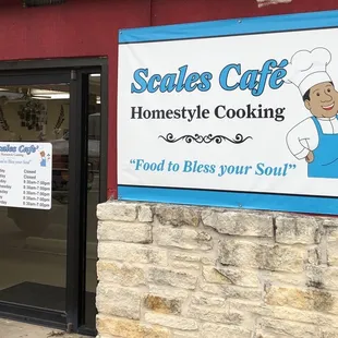 Hours and front door, off to the side behind the gas station.