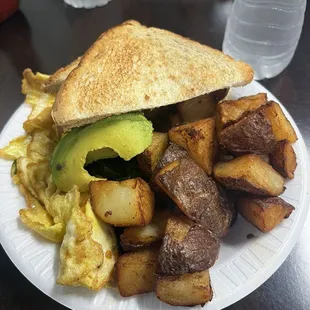 Avocado, Spinach and Tomato Omelet with giant Roasted Potatoes and Toast