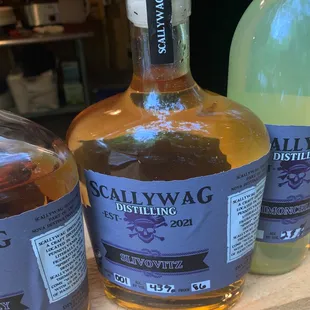 three bottles of alcohol