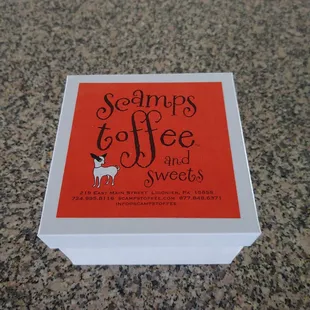 a box of scamps toffee and sweets