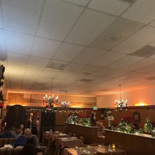 a dining area with tables and chairs