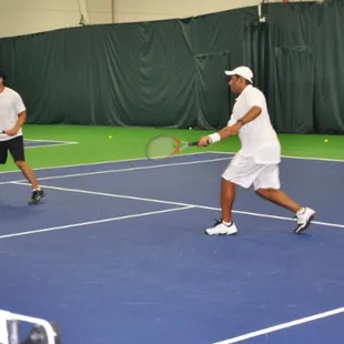 Tennis player on the state of the art indoor courts!