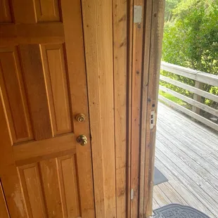 Door to adjoining room and entry door to the room