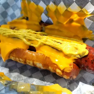 Sausage Pretzel with cheese sauce and mustard