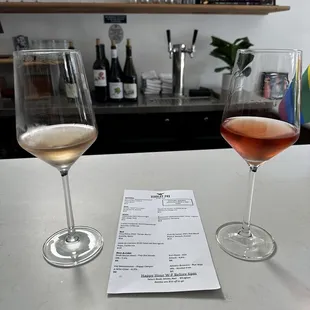Two glasses of wine with the menu