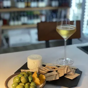 Cheese plates, olives and other snacks now available!