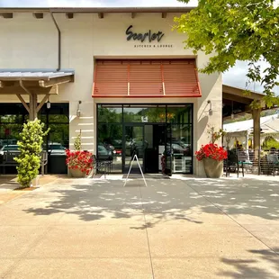Storefront. Outdoor patio is located to the right side.