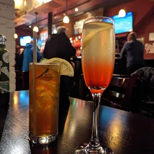 L: Pimm&apos;s Cup, R: French 75 (sun vodka)