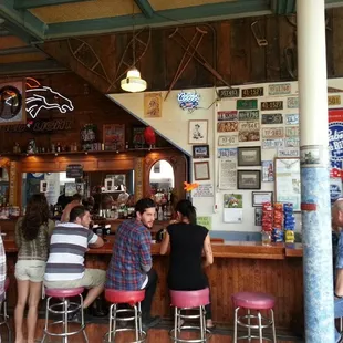 people sitting at the bar