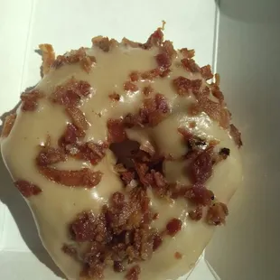 a glazed donut with bacon