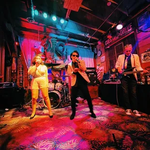a group of people on stage