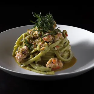 Tagliolini Agli Scampi with prawns, heirloom tomatoes, capers, lemon, garlic and butter sauce