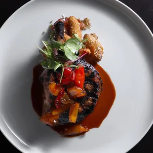 Pork Chop with
cherry peppers &quot;agro dolce&quot;, crispy parmesan
fingerling potatoes, toasted fennel pork jus