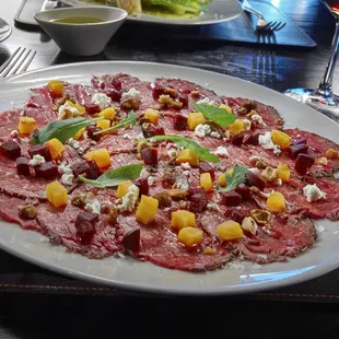 Beef Carpaccio with heirloom beets, candied hazelnuts, goat cheese, fennel pollen &amp; lavender