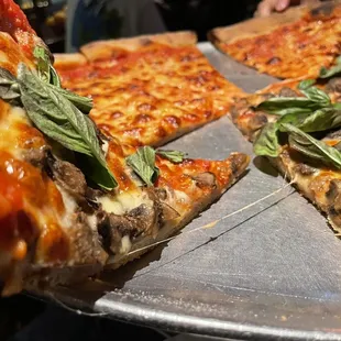a close up of a slice of pizza