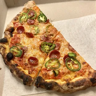 Hot Boi Pie - sauce, cheese, beef pepperoni, jalapeños, Mike's hot honey.