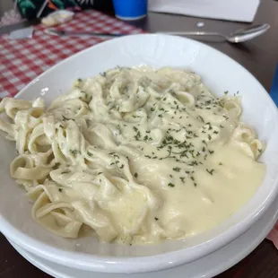 Homemade Fettuccine Alfredo after taking some bites...we were hungry!!!