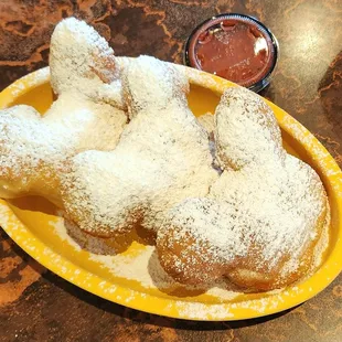 Mickey-shaped beignets, $7.79. Comes w/1 dipping sauce. The strawberry sauce is tasty by itself but doesn't go well with the beignets.