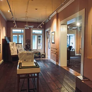 Scene By Rhys Fine Art, the St. Philip-side room, at 1036 Royal in August 2021.