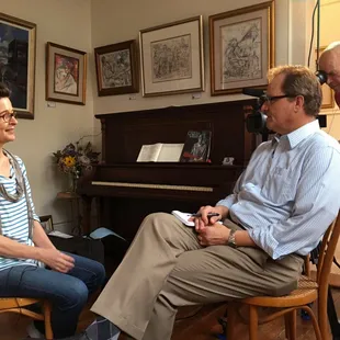 The artist, Emilie Rhys, being interviewed in the gallery by WWL-TV anchor Mike Hoss in May 2017 for a tv feature.