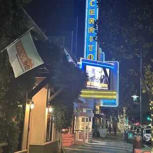 a neon sign for a wine bar