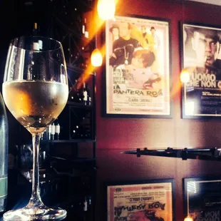 a glass of wine and a bottle of wine