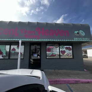 a car parked in front of the store