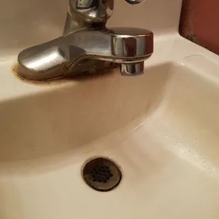 A little Soft Scrub might do the trick on the bathroom sinks.