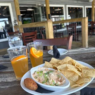 Stuffed jalapeños, crab dip, and Blue Moon.